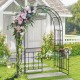 Garden arbor with gate in black, featuring elegant flower decoration and sturdy galvanized metal for outdoor weddings.