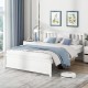 Full-size wooden platform bed in white with headboard, slatted support, and elegant design for stylish bedroom decor.