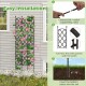 Black metal plant support frame with pink flowers, adjustable height for climbing plants, ideal for raised garden beds.