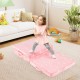 Foldable pink floor mattress for kids with washable flannel cover, perfect for playtime or relaxation in any room.
