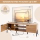 2-door TV stand in natural finish with open shelves, suitable for TVs up to 65 inches, featuring a charging station.