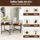 Rustic brown round coffee table set of 2 showcasing a smooth surface and X-shaped metal frame, ideal for snacks and.