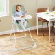 Compact highchair in green with adjustable tray and footrest, perfect for mealtime convenience and easy cleaning.