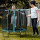55-inch blue trampoline for kids with safety enclosure net, featuring robust galvanized steel frame and bungee cords.