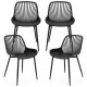 Set of four modern black kitchen chairs with metal legs and cutout backrest, perfect for dining rooms and home offices.