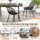 Black modern kitchen chair with metal legs and cutout backrest, perfect for dining rooms and home offices.
