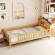 Twin size kids Montessori bed showcasing natural pine wood, designed with a fun house-shaped headboard and open access.
