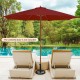 10 feet wine patio umbrella with 8 wooden ribs, adjustable heights, and vented roof for outdoor shade by the pool.