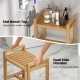 Teak wood shower bench with slat top for quick drainage and dual side handles for easy movement in the bathroom.