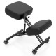 Height adjustable kneeling chair with thick padded cushions and lockable wheels for posture correction and comfort.