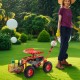 Heavy duty garden cart in red with a 360 swivel seat, tool tray, and large wheels for easy outdoor mobility.