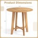Round 31.5" patio dining table with slatted teak wood top and X-shaped frame, ideal for gardens and patios.