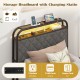 Twin size bed frame with LED lights, charging station, and storage headboard for organized bedroom space.