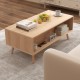 Mid-century modern rattan coffee table featuring an open compartment and natural wood finish, ideal for stylish display.