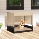 Elevated wicker dog house in black with removable cushion, suitable for small to medium breeds, for indoor and outdoor.