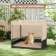 Elevated wicker dog house for small to medium breeds with removable cushion, sturdy frame, and all-round ventilation.