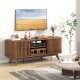 Walnut 2-door TV stand with retro fence design, adjustable shelves, and spacious tabletop for TVs up to 60 inches.