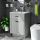 Gray bathroom vanity unit with basin, featuring two doors and sleek handles for elegant storage and easy installation.