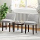 Two gray upholstered chairs with a brown accent table, perfect for kitchen or living room use.