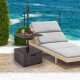 Outdoor fillable umbrella base with table tray in brown, designed for stability and versatility by the poolside.