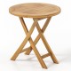 Round teak wood dining table featuring a slatted top and X-shaped frame, ideal for enhancing outdoor charm and.