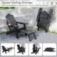Black All-Weather HIPS Adirondack lounge chair with retractable footrest, perfect for outdoor relaxation and.