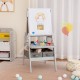 Gray 3-in-1 art easel for kids featuring a magnetic chalkboard and whiteboard, with storage bins for art supplies.