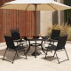 Four black outdoor folding sling chairs with armrests around a round table, perfect for patio gatherings.