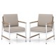 Two patio aluminum sofa chairs with wicker backrest and soft cushions, perfect for outdoor relaxation by the poolside.