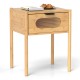 Bamboo nightstand with a spacious tabletop and reeded drawer, featuring a natural finish for stylish bedroom decor.