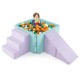 Soft play set featuring a ball pit, ramp, and staircase in purple, promoting imaginative play and motor skills for.