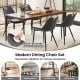 Gray dining chair set of 4 with faux leather upholstery and metal legs, featuring built-in handles for easy movement.