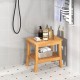 20-inch non-slip shower bench with curved top, solid teak construction, and storage shelf for towels and supplies.