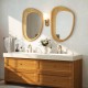 Bohemian irregular wall-mounted decorative mirror with a sturdy wooden frame, ideal for rustic elegance in any room.