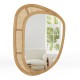 Bohemian irregular wall-mounted mirror with a natural wooden frame and rattan style, perfect for living room or.