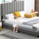 Foldable gray baby bed guard rail with adjustable strap, providing safety and stability for toddlers getting in and out.