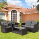 4-piece patio rattan conversation set with gray cushions, featuring a coffee table, loveseat, and two single sofas.