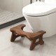 Teak wood toilet stool with non-slip foot pads, arch-shaped design, suitable for kids and adults, for bathroom use.