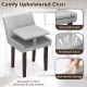 Gray upholstered leisure chair with soft-padded seat and removable cushion, perfect for living or dining room comfort.