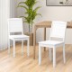 White wood dining chair set of 2 with rubber wood legs, featuring a curved backrest for comfort in a rustic kitchen.