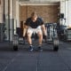 Olympic Hex Trap Bar with foldable handles and knurled grips, ideal for strength training in arms, core, and legs.