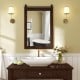 Rustic wood frame barn door style wall mirror in walnut, featuring a high-definition mirror for versatile decor.