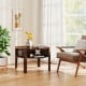Rustic brown round coffee table with a stylish design and spacious side shelves, perfect for modern living spaces.