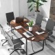 Oval 71-inch rustic brown executive table with cable management hole, ideal for office meetings and training rooms.