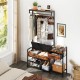 Detail view of the hooks and mesh shelves on the rustic brown hall tree, designed for efficient coat and shoe.