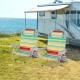 Two multicolor foldable beach chairs with cup holders and storage pockets, set up by the water for outdoor relaxation.