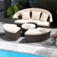 Patio round daybed with retractable canopy, hand-woven PE rattan, and cozy cushions, ideal for poolside relaxation.