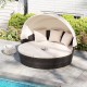 Round patio daybed with retractable canopy, PE rattan, and plush cushions, ideal for poolside relaxation.