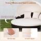 Close-up of the white seat cushion and throw pillows on the patio round daybed with a retractable canopy for outdoor.