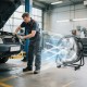 Industrial drum fan with 360-degree tilt and wheels, providing powerful airflow for efficient ventilation in workshops.
